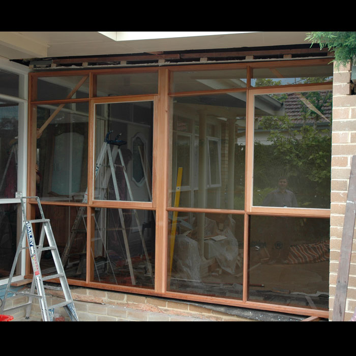 Awning sash with raking head