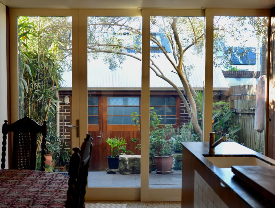 One hinged & three bottom roller sliding doors, double glazed. Erskineville, 2018.