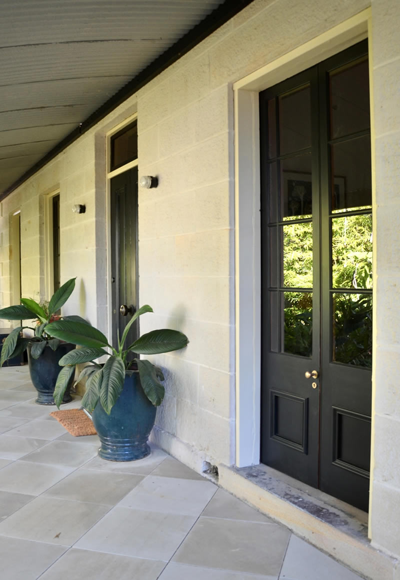 A pair of eight light Gunstock Doors. Forest Lodge, 2022